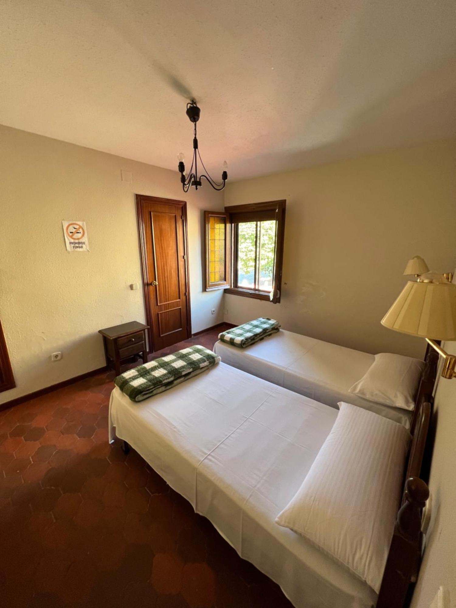 Hotel Hostal Sabor Fusion à La Pradera de Navalhorno Extérieur photo